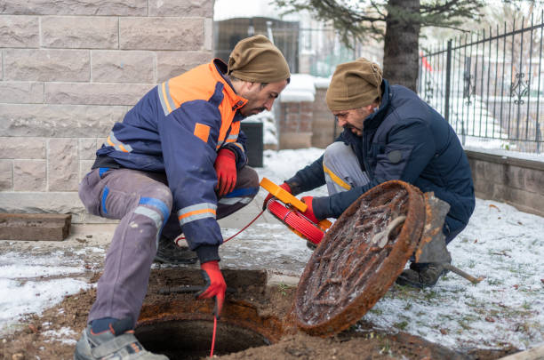 Arvada emergency plumber performing drain cleaning service